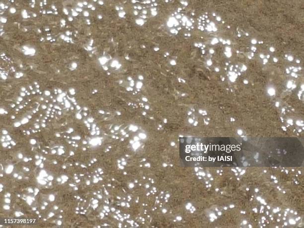 glittering sea water in the sun, close-up - sharon plain stock-fotos und bilder