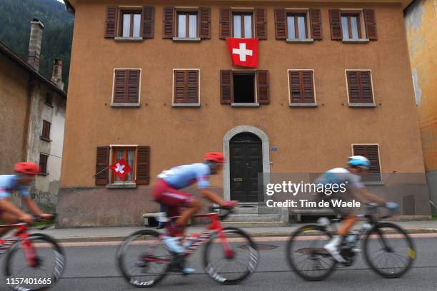 Peloton / Switzerland Flag / Fans / Public / City / during the 83rd Tour of Switzerland, Stage 7 a 216,6km stage from Unterterzen to San Gottardo...