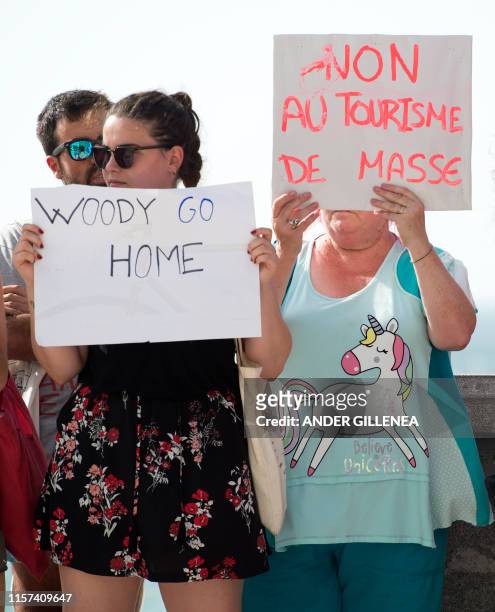 Protesters demonstrate against the shooting of Woody Allen's new film in the Spanish Basque city of San Sebastian on July 23, 2019. - The...