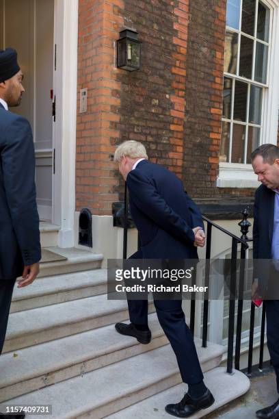 On the day that the Conservative Party elects its leader and the country's Prime Minister, Boris Johnson, surrounded by close protection police...