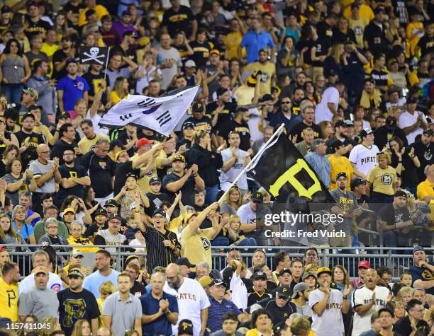 Pittsburgh fans cheer for their team during a game between the Pittsburgh Pirates and the Chicago Cubs on Wednesday, September 16, 2015 at PNC Park...