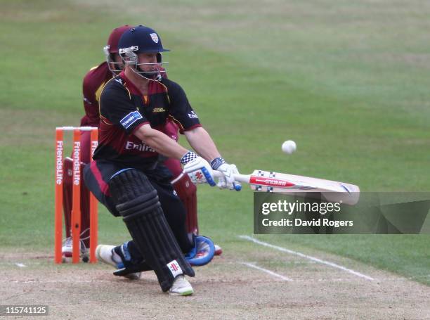Philip Mustard of Durham sweeps the ball for four during the Friends Life T20 match between Northamptonshire and Durham at Wantage Road on June 9,...