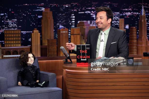 Episode 1095 -- Pictured: Host Jimmy Fallon discusses "Tonight Show Summer Reads" with a Timothée Chalamet puppet July 23, 2019 --