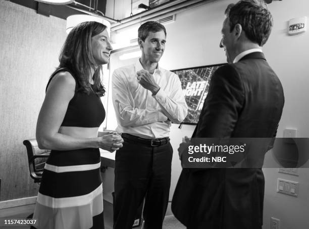 Episode 861 -- Pictured: 2020 Democratic Presidential candidate Beto O'Rourke with his wife Amy Hoover Sanders talk with host Seth Meyers backstage...