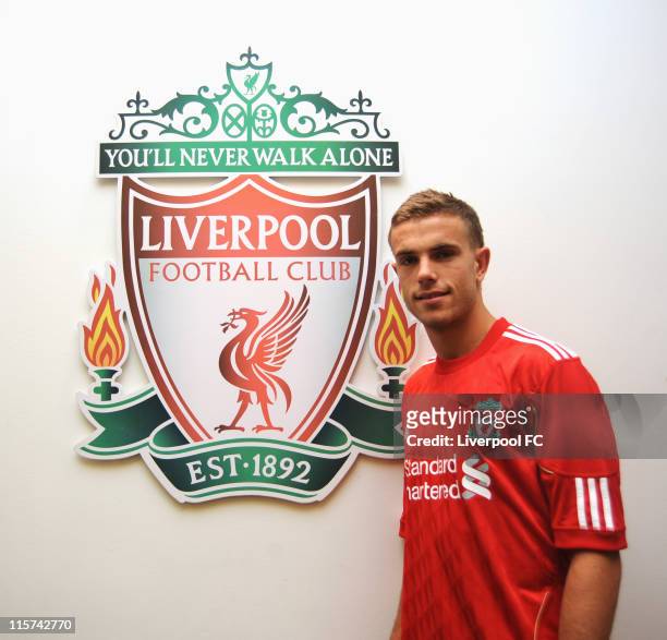 Jordan Henderson poses as he signs for Liverpool FC at Melwood Training Ground on June 8, 2011 in Liverpool, England.