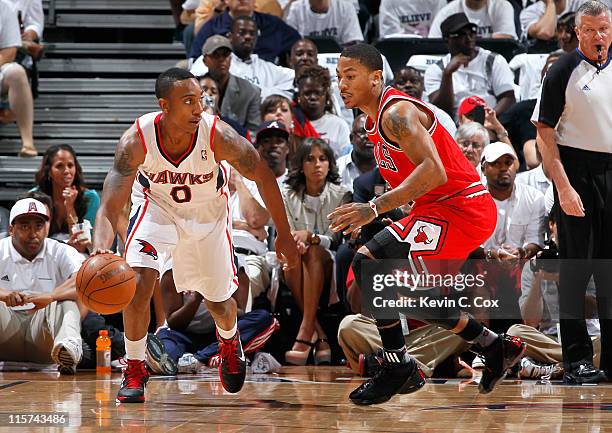 Jeff Teague of the Atlanta Hawks against the Derrick Rose of the Chicago Bulls in Game Six of the Eastern Conference Semifinals in the 2011 NBA...