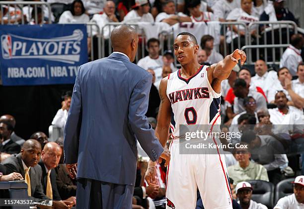 Jeff Teague and Larry Drew of the Atlanta Hawks against the Chicago Bulls in Game Six of the Eastern Conference Semifinals in the 2011 NBA Playoffs...