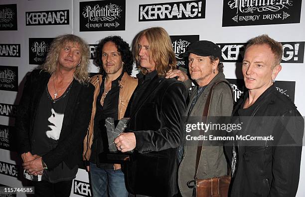 Def Leppard with their Inspiration award during The Relentless Energy Drink Kerrang! Awards at The Brewery on June 9, 2011 in London, England.