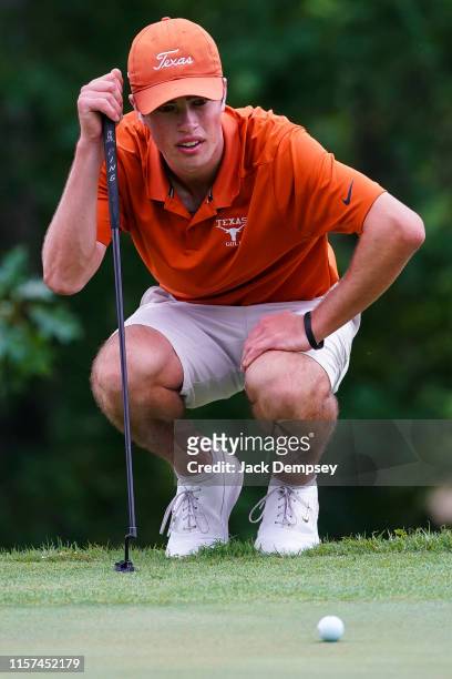 Cole Hammer of Texas reads a putt on the 14th green during the Division I Men's Golf Match Play Championship held at the Blessings Golf Club on May...