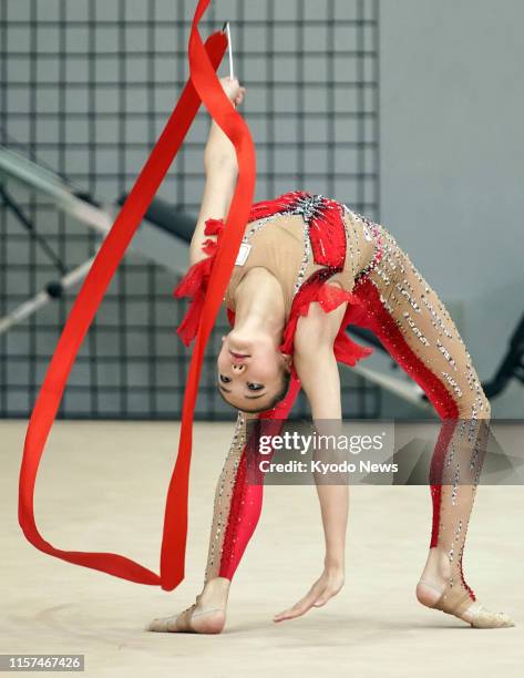Sumure Kita, a member of Japan women's rhythmic gymnastics team, known as Fairy Japan, practices in Tokyo on July 24 exactly a year before the...