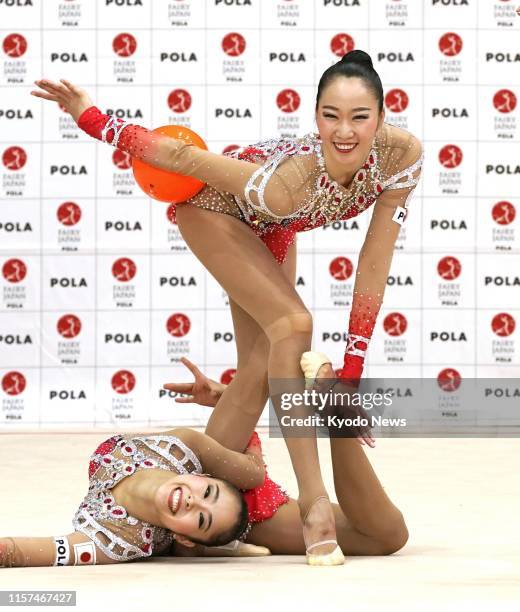 Members of Japan women's rhythmic gymnastics team, known as Fairy Japan, practice in Tokyo on July 24 exactly a year before the opening of the Tokyo...