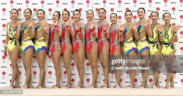 Members of Japan women's rhythmic gymnastics team, known as Fairy Japan, pose after practice in Tokyo on July 24 exactly a year before the opening of...