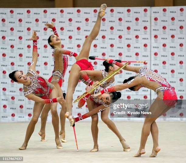 Members of Japan women's rhythmic gymnastics team, known as Fairy Japan, practice in Tokyo on July 24 exactly a year before the opening of the Tokyo...