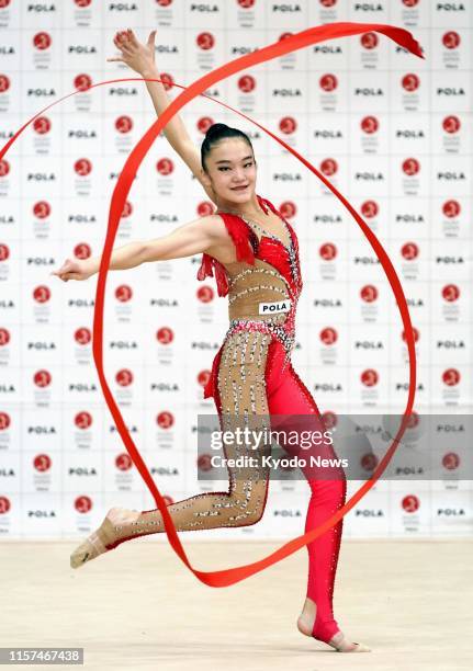 Sumure Kita, a member of Japan women's rhythmic gymnastics team, known as Fairy Japan, practices in Tokyo on July 24 exactly a year before the...