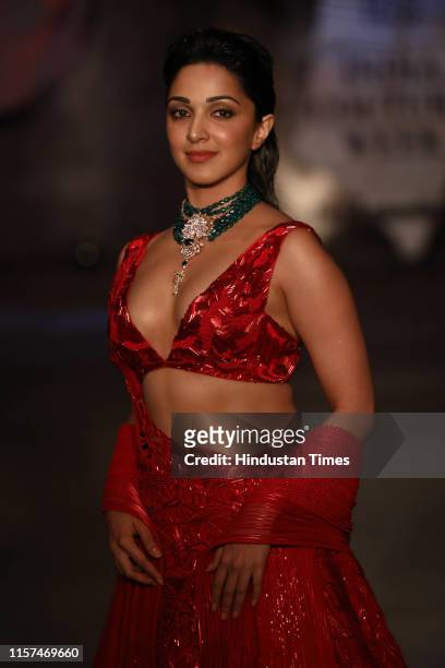 Bollywood actor Kiara Advani walks the ramp for the designer Amit Aggarwal at the first day of the 12th edition of the FDCI India Couture Week, on...