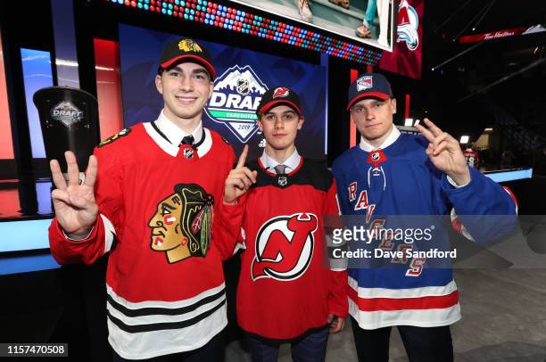 Kirby Dach, third overall pick by the Chicago Blackhawks, Jack Hughes, first overall pick by the New Jersey Devils, and Kaapo Kakko, second overall...