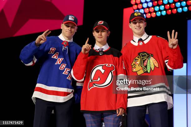 Kaapo Kakko, second overall pick by the New York Rangers, Jack Hughes, first overall pick by the New Jersey Devils, and Kirby Dach, third overall...