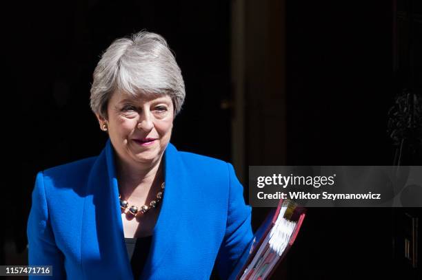 Theresa May leaves 10 Downing Street for her final PMQ session in the House of Commons before officially stepping down as prime minister on 24 July,...