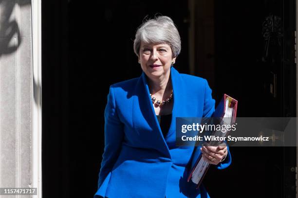 Theresa May leaves 10 Downing Street for her final PMQ session in the House of Commons before officially stepping down as prime minister on 24 July,...