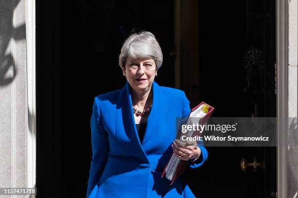 Theresa May leaves 10 Downing Street for her final PMQ session in the House of Commons before officially stepping down as prime minister on 24 July,...