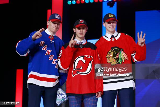 Kaapo Kakko, second overall pick by the New York Rangers, Jack Hughes, first overall pick by the New Jersey Devils, and Kirby Dach, third overall...