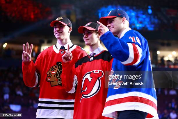 Kirby Dach, third overall pick by the Chicago Blackhawks, Jack Hughes, first overall pick by the New Jersey Devils, and Kaapo Kakko, second overall...