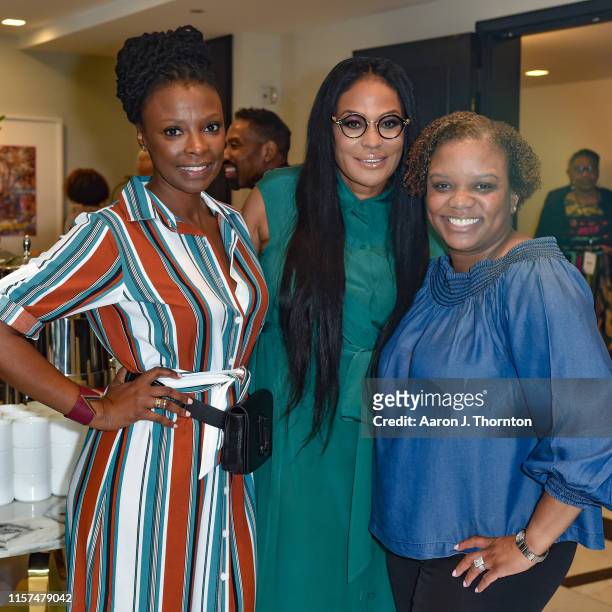 Networks Senior Manager Event Productions and Corporate Relations Natasha Bryson poses with panelists Beverly Bond and a guest at the META Brunch and...