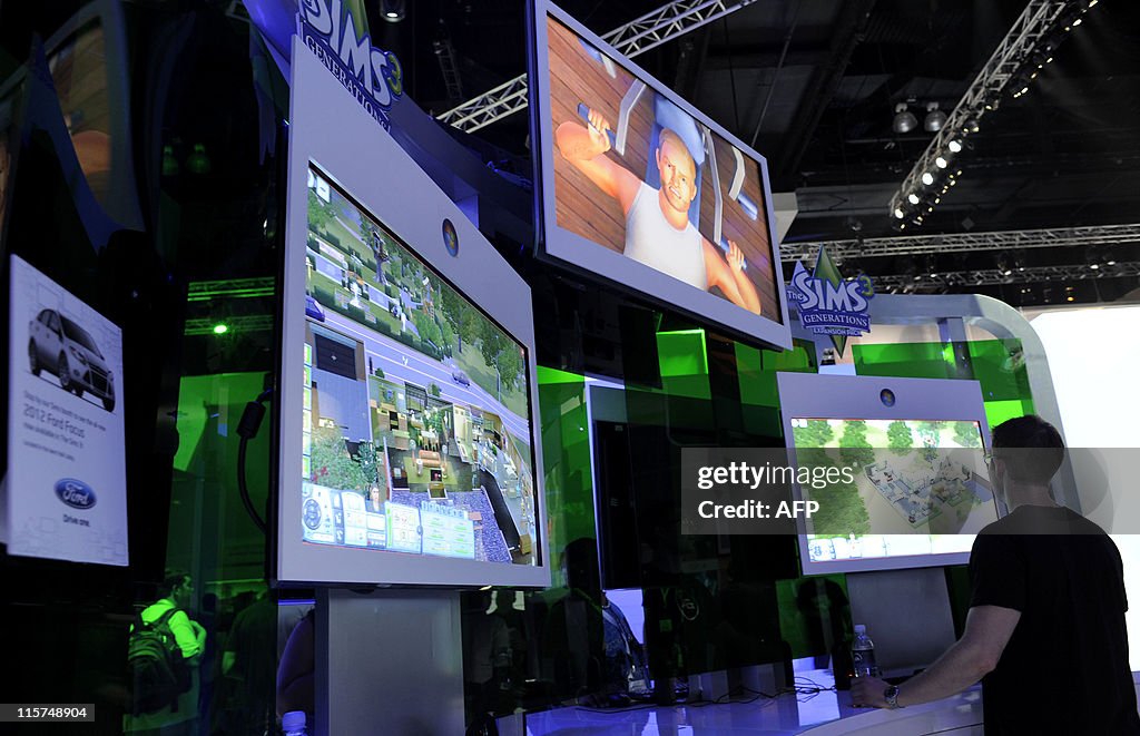 Gamers plays the video game "Sims" at th