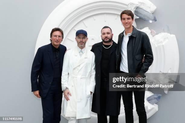 Of Dior Pietro Beccari, Decorator of the event Daniel Arsham, Stylist Kim Jones and CEO of Rimowa, Alexandre Arnault pose after the Dior Homme...