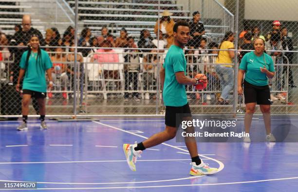 Tetona Jackson, Jelani Winston and Perri Camper play in the 2019 BET Experience Celebrity Dodgeball Game at Staples Center on June 21, 2019 in Los...