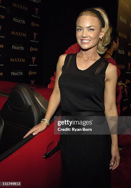 Kelly Carlson with 2006 Pontiac Solstice roadster during 2006 Maxim Hot 100 Party - Red Carpet at Buddha Bar in New York City, New York, United...