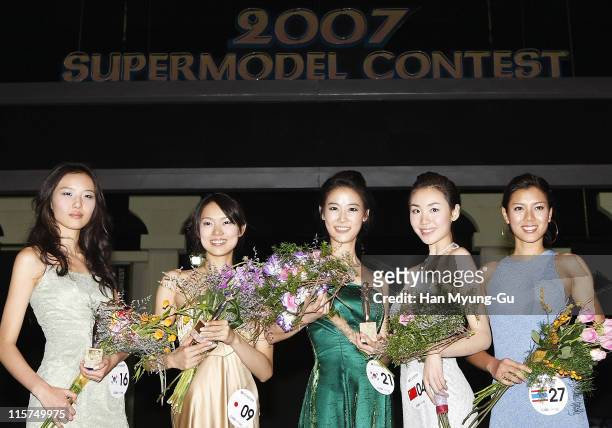 South Korea, Yang Eun-Young and Japan,Kana Chin and South Korea, Lee Hyun-Ju and China, Zhao Xiang and Thailand, Surunsuriyakul Kingkan poses for...