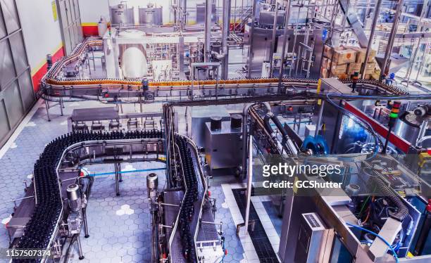bottling plant in africa - food and drink industry stock pictures, royalty-free photos & images