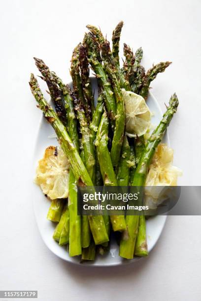 asparagus lemon baked - cooked asparagus stock pictures, royalty-free photos & images