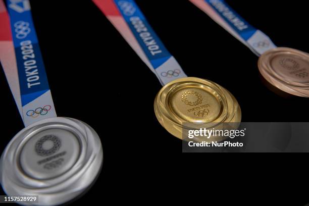 The silver, gold and bronze medals are unveiled in the Tokyo 2020 medal design unveiling ceremony during Tokyo 2020 Olympic Games "One Year To...