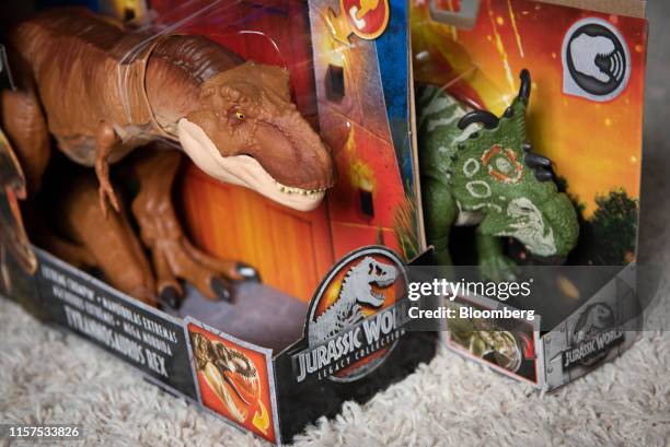 Mattel Inc. Jurassic World brand dinosaur figurines are arranged for a photograph in Atlanta, Georgia, U.S., on Saturday, July 20, 2019. Mattel is...