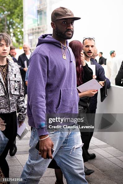 Virgil Abloh, wearing a purple sweatshirt, blue jeans and brown Louis  News Photo - Getty Images