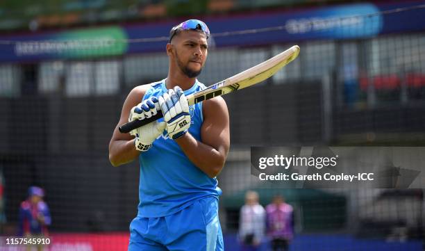 Nicholas Pooran of the West Indies warms up ahead of the Group Stage match of the ICC Cricket World Cup 2019 between West Indies and New Zealand at...