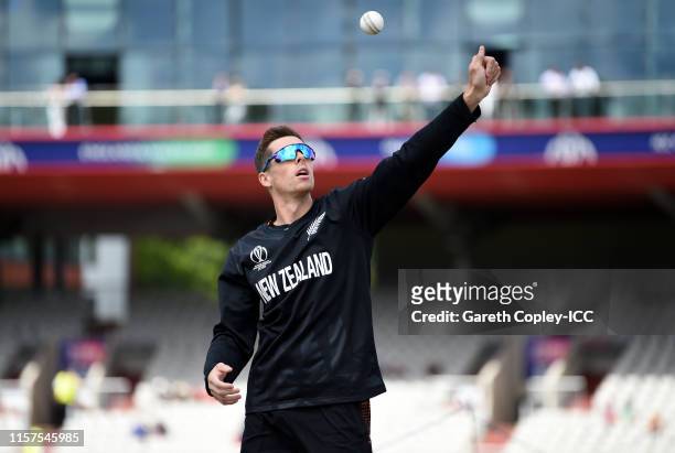 Mitchell Santner of New Zealand warms up ahead of the Group Stage match of the ICC Cricket World Cup 2019 between West Indies and New Zealand at Old...