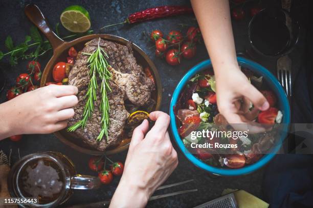 enjoying dinner - lunch top view stock pictures, royalty-free photos & images