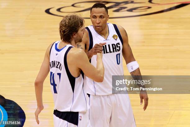 Dirk Nowitzki and Shawn Marion of the Dallas Mavericks celebrate their 112-103 win against the Miami Heat in Game Five of the 2011 NBA Finals at...