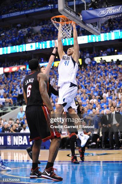 Dirk Nowitzki of the Dallas Mavericks dunks against the Miami Heat during Game Five of the 2011 NBA Finals on June 9, 2011 at the American Airlines...