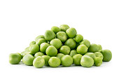 Heap of green peas close up on a white background. Isolated
