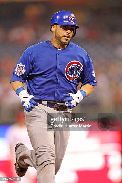 Catcher Geovany Soto of the Chicago Cubs rounds the bases after hitting a game tying home run during a game against the Philadelphia Phillies at...