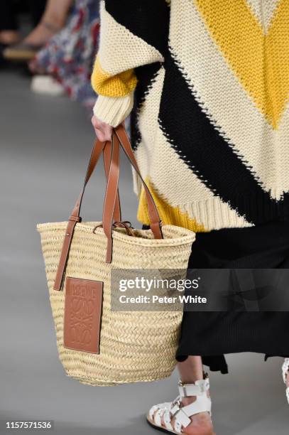 Model, bag details, walks the runway during the Loewe Menswear Spring Summer 2020 show as part of Paris Fashion Week on June 22, 2019 in Paris,...