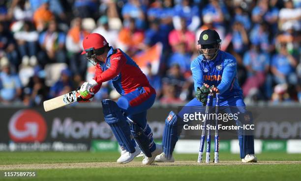 Afghanistan batsman Rashid Khan is stumped by MS Dhoni during the Group Stage match of the ICC Cricket World Cup 2019 between India and Afghanistan...