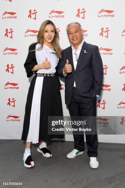 Rita and Li Ning attend the Li-Ning Menswear Spring Summer 2020 show as part of Paris Fashion Week on June 22, 2019 in Paris, France.