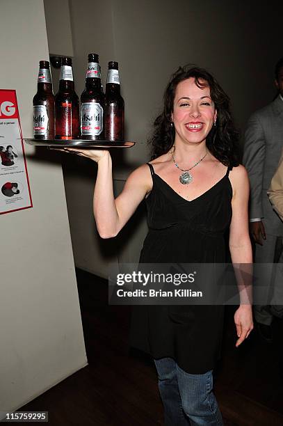 Director of Operations for Rouge Tomate Erin Bellard holds a tray of Asahi Beer during the Gotham Magazine toast of Mary Louise Parker as Hedda...