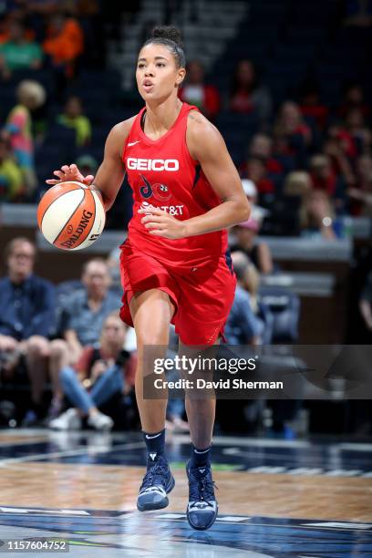 Natasha Cloud of the Washington Mystics handles the ball against the Minnesota Lynx on July 24, 2019 at the Target Center in Minneapolis, Minnesota...