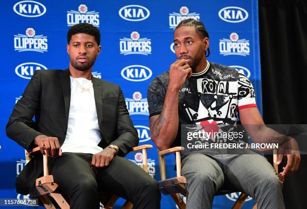 Basketball players Kawhi Leonard and Paul George are introduced as the new players of the Los Angeles Clippers during a press conference in Los...